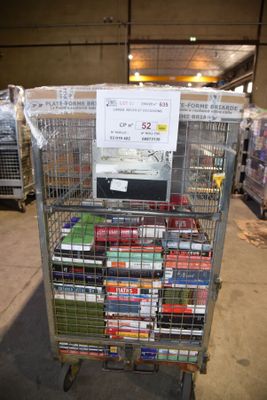 a metal cart with a lot of books on it