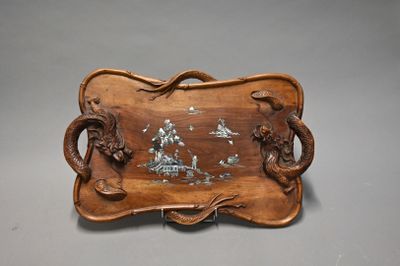 an image of a wooden tray with a picture of a ship on it
