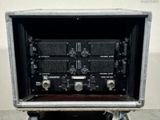 an old radio that is sitting on top of a stand