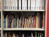 many books on the shelves in the library