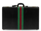 black suitcase with green, red and red stripes on the side