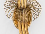 gold plated wall sconce with flowers and leaves in the shape of a flower