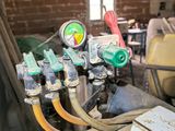 a bunch of hoses that are connected to a water heater