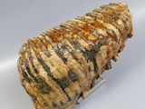 a large piece of food that is sitting on a white surface