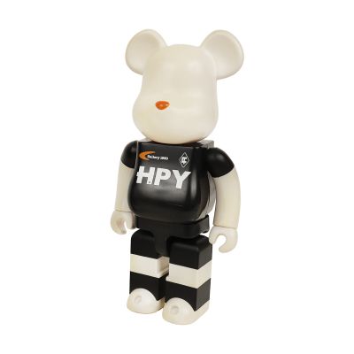 a black and white bear with a black shirt on
