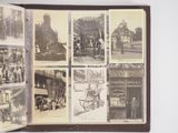 an old photo of a book with pictures of people and a horse drawn carriage