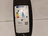a close up of a tire with a sticker on it