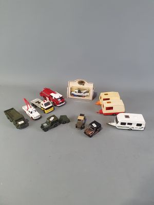a lot of toy vehicles that are on the table