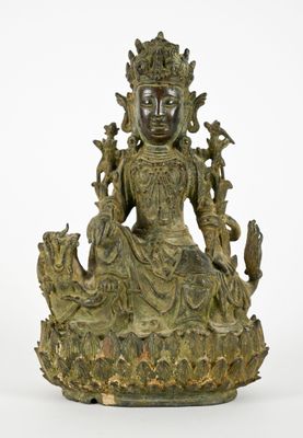 an image of a bronze statue of a woman sitting on a lotus