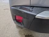 a close up of the rear end of a car with a sticker on it