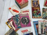 a lot of books that are on a table