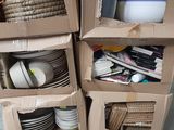 several cardboard boxes stacked on top of each other in a room