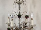 a chandelier with a bunch of candles hanging from it