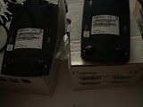two radio ' s sitting on top of a box
