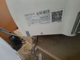 a close up of a computer monitor with a qr code on it