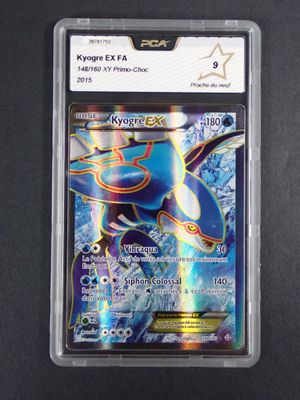 a close up of a pokemon card on a black surface