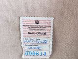 a close up of a label on the back of a chair