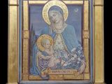 une image d'un tableau représentant une femme tenant un enfant dans ses bras