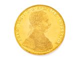 l'image d'une pièce d'or sur laquelle figure le visage d'une femme