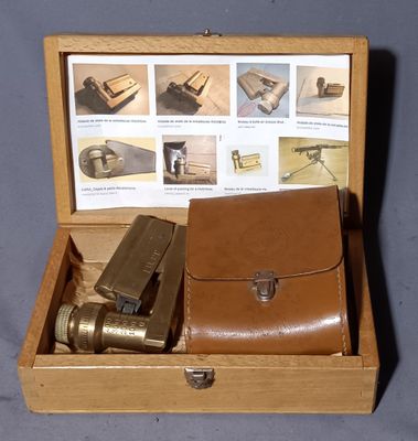 a box with a lighter and other items in it