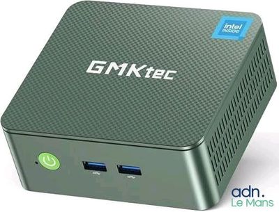 a close up of a green box with a blue button on it