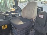 a picture of a tractor with a seat and a steering