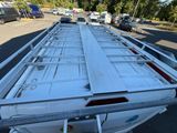 an image of a truck with a flat bed on the back
