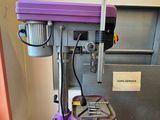 a machine that is sitting on a stand in a room