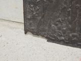 a close up of a metal object on the ground