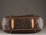 an image of a louis vuitton bag on a table