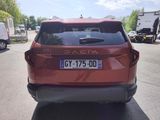 a red car parked on the side of the road