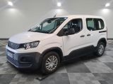 a picture of a white van parked on a checkered floor
