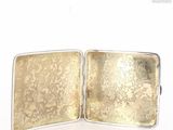 silver plated cuff bracelet with a gold plated clasp