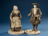 pair of ivory figurines of a man and a woman