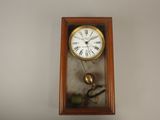 a clock that is hanging on the wall in the room