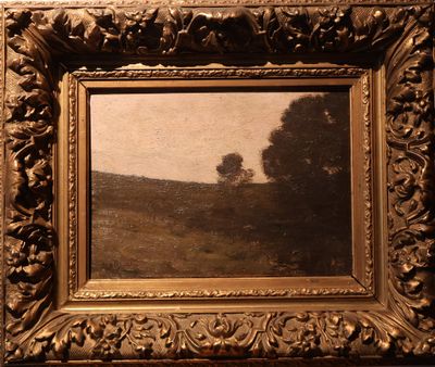 tableau représentant un paysage avec un arbre solitaire, dans un cadre doré