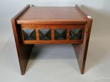 an image of a small wooden table with glass inserts