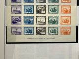 a picture of a framed picture of a collection of stamps