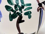 a white vase with a painting of a tree on it