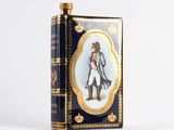 an old book with a picture of a man and a dog on it