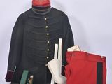 uniform of a soldier with a red beret and a red bag