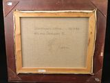 an old picture frame with a picture of a man on it