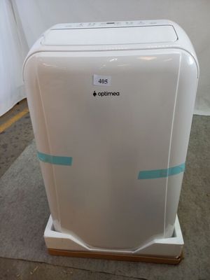 un petit climatiseur blanc posé par terre