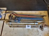 many wrenches that are sitting on a table