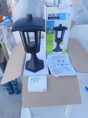 a lamp that is sitting on top of a cardboard box