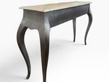 an image of a black table with a marble top and legs