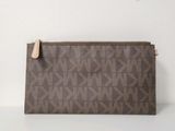 an image of a purse with a tag on it sitting on a table