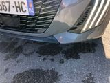 a close up of a car ' s license plate on the front of it