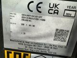 a label on the back of a machine that is on display