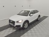 the white audi suv is parked in the garage